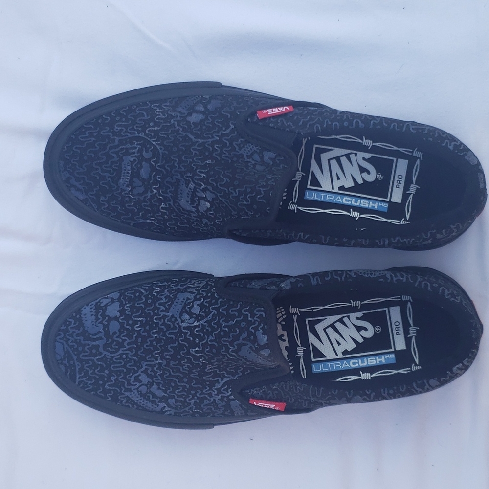 Vans, men's size 7, black with silver print